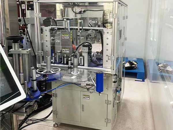 自動貼標機，自動接標機，機械手自動連接標簽